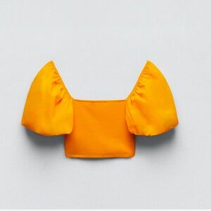 Woman’s Zara orange shirt